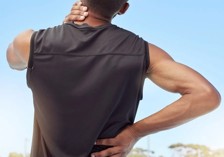 Provider evaluating chronic knee and shoulder joint pain at Regen & Restore