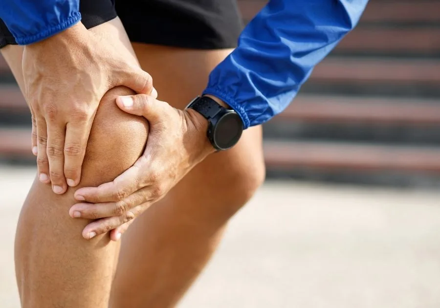 Provider evaluating a patient for chronic knee joint pain relief at Regen & Restore